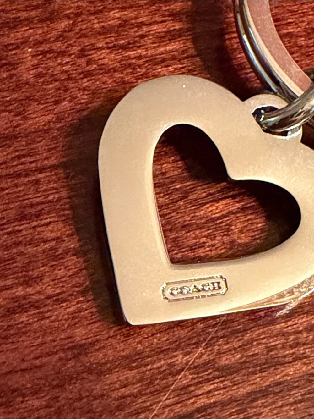 Coach Silver-Tone Key Ring with Pink Rhinestones